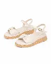 Sandalias marfil con plataforma trenzada.webp