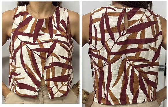 Blusa sisa escote delantero cruzado.