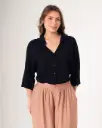 Camisa manga seguida.