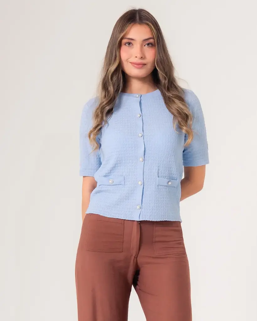 Blusa corta tipo cardigan con textura tejida azul
